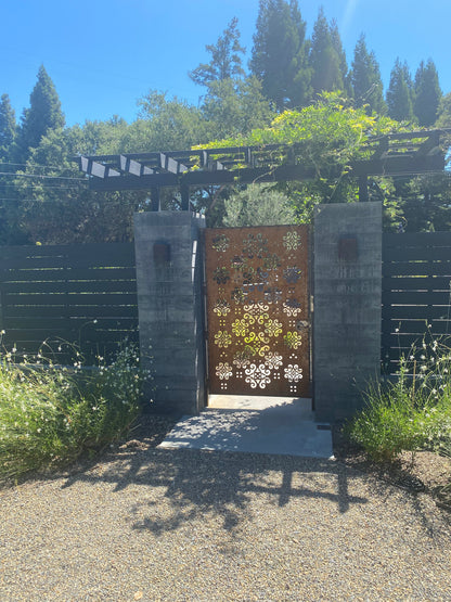Outdoor Metal Privacy Screen Panel by Rustica Ornamentals in dark steel with ornate cutout on Tampa Home & Garden Store