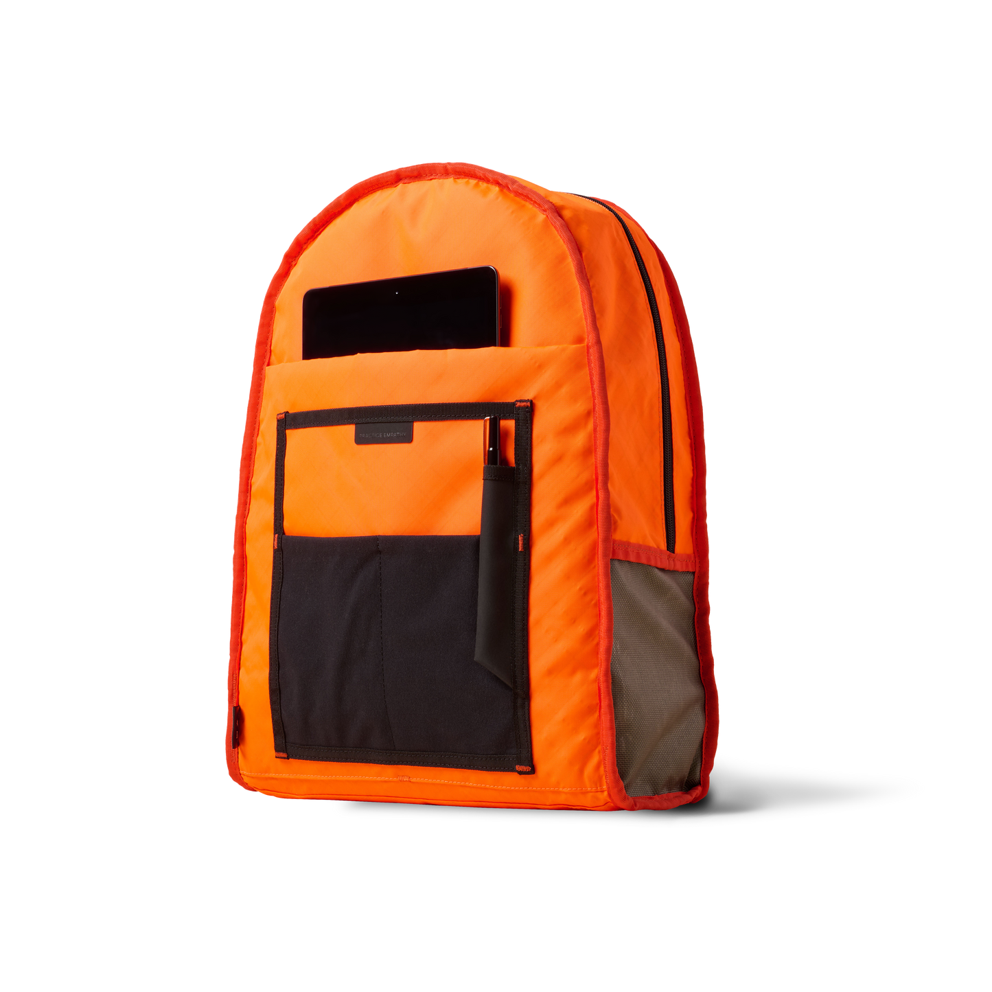 Standard Issue backpack orange with black pocket and phone pocket by The Brown Buffalo on Tampa Home & Garden Store