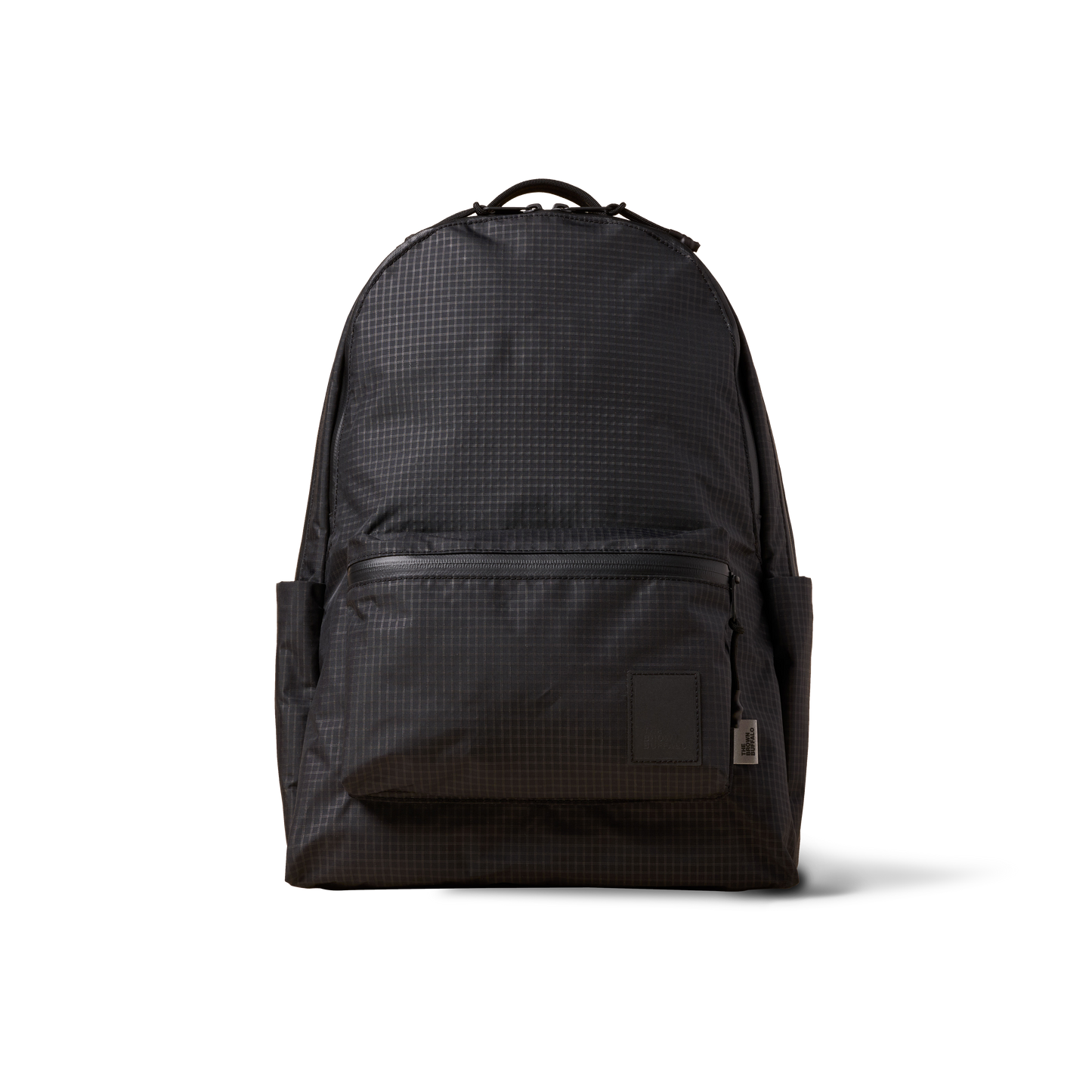 Standard Issue backpack by The Brown Buffalo in dark grid fabric with front pocket on Tampa Home & Garden Store