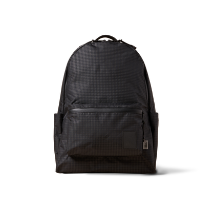 Standard Issue backpack by The Brown Buffalo in dark grid fabric with front pocket on Tampa Home & Garden Store