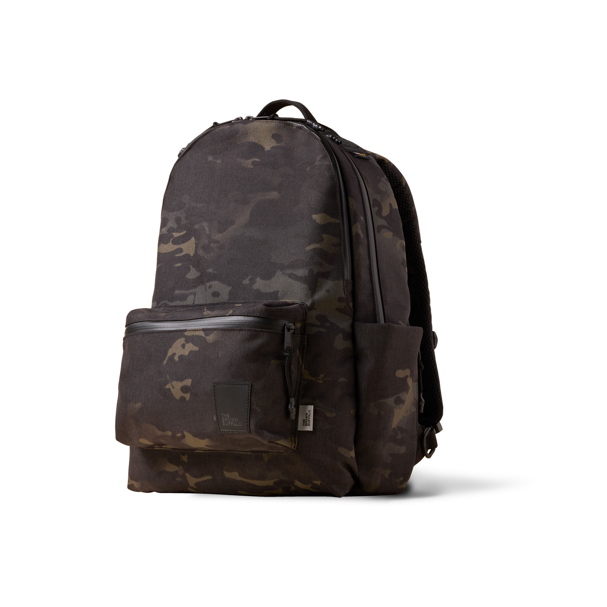 Backpack in camouflage from The Brown Buffalo Standard Issue with front zip pocket on Tampa Home & Garden Store