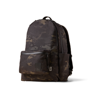 Backpack in camouflage from The Brown Buffalo Standard Issue with front zip pocket on Tampa Home & Garden Store