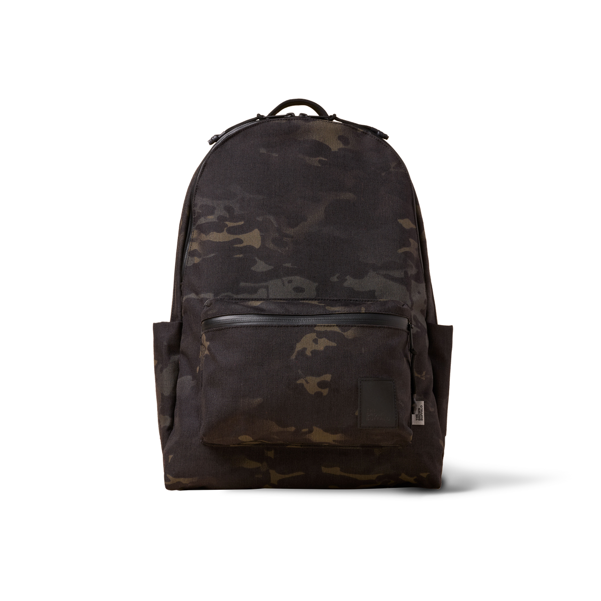 Standard Issue backpack camouflage by The Brown Buffalo with top handle and front pocket on Tampa Home & Garden Store