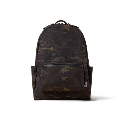 Standard Issue backpack camouflage by The Brown Buffalo with top handle and front pocket on Tampa Home & Garden Store