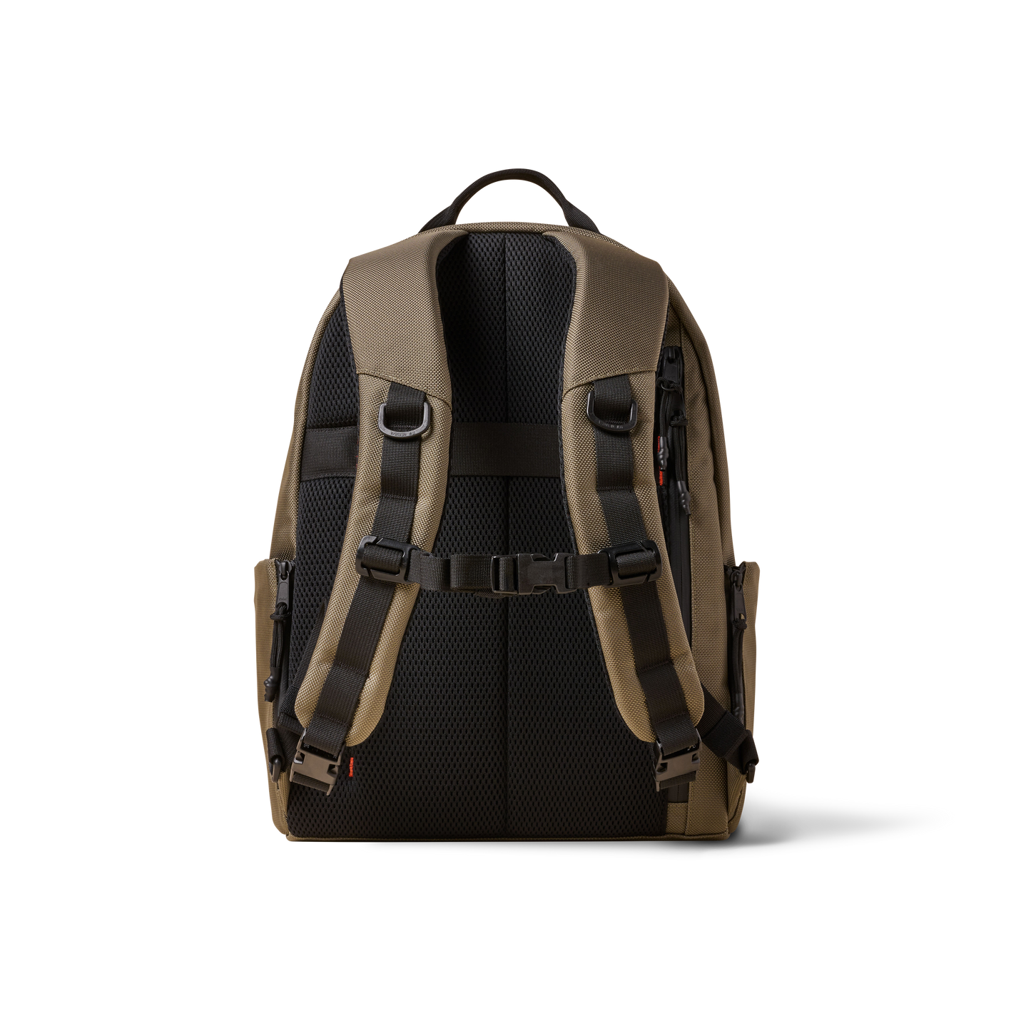 Standard Issue backpack by The Brown Buffalo, tan fabric with black padded back on Tampa Home & Garden Store