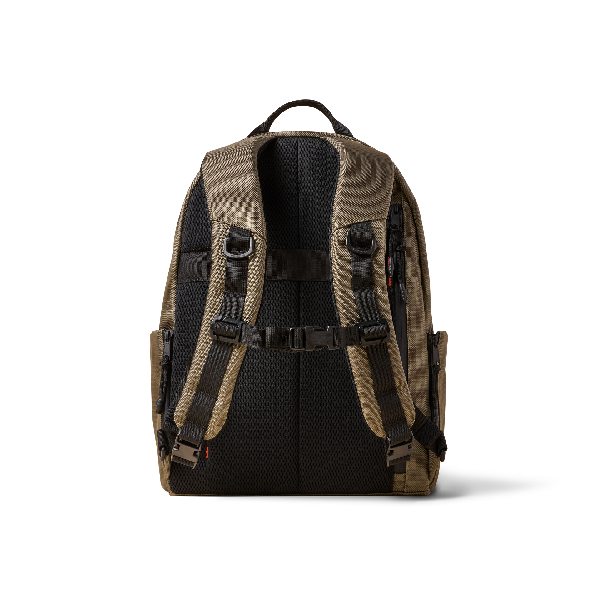 Standard Issue backpack by The Brown Buffalo, tan fabric with black padded back on Tampa Home & Garden Store