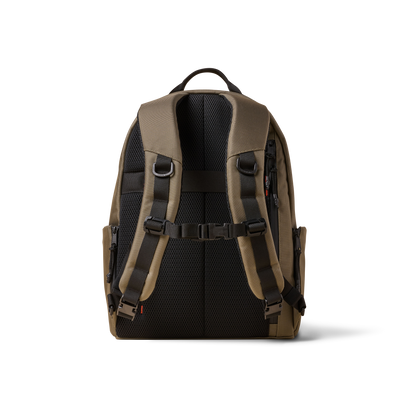 Standard Issue backpack by The Brown Buffalo, tan fabric with black padded back on Tampa Home & Garden Store