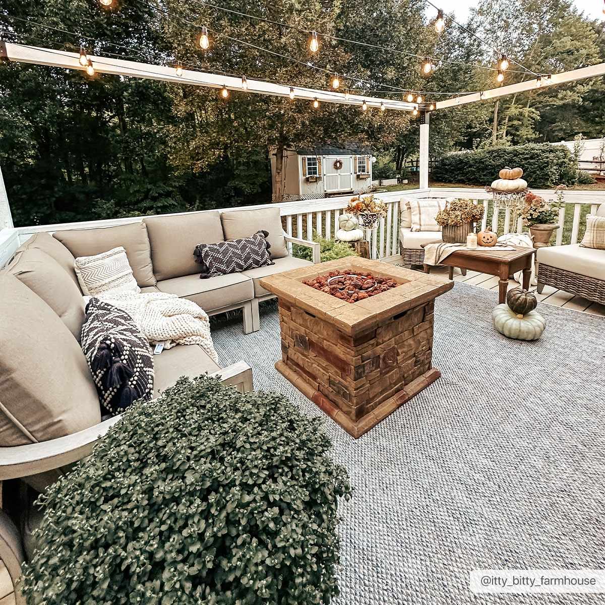 Stenhousemuir Luxe Handmade Rug outdoor gray woven rug under beige sectional seating on Tampa Home & Garden Store