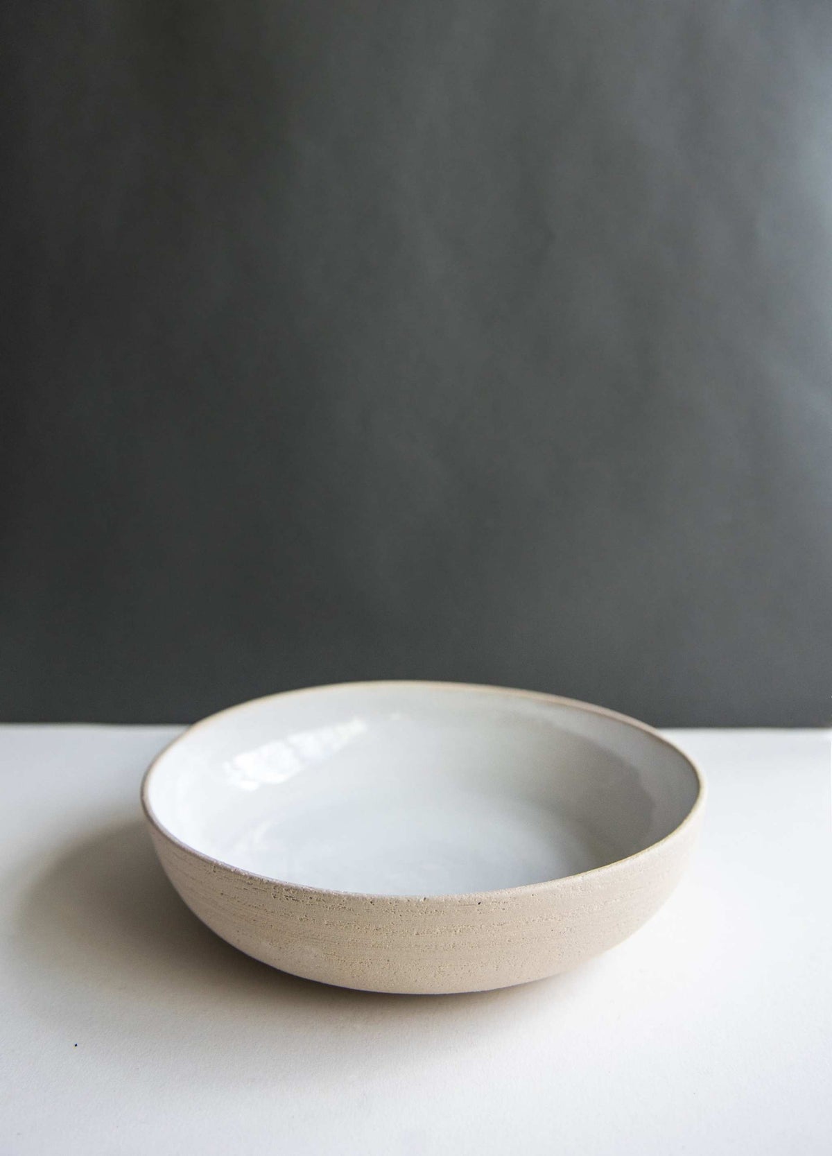 Handmade stoneware pasta bowl by CREATING COMFORT, white glaze with natural rim on Tampa Home & Garden Store