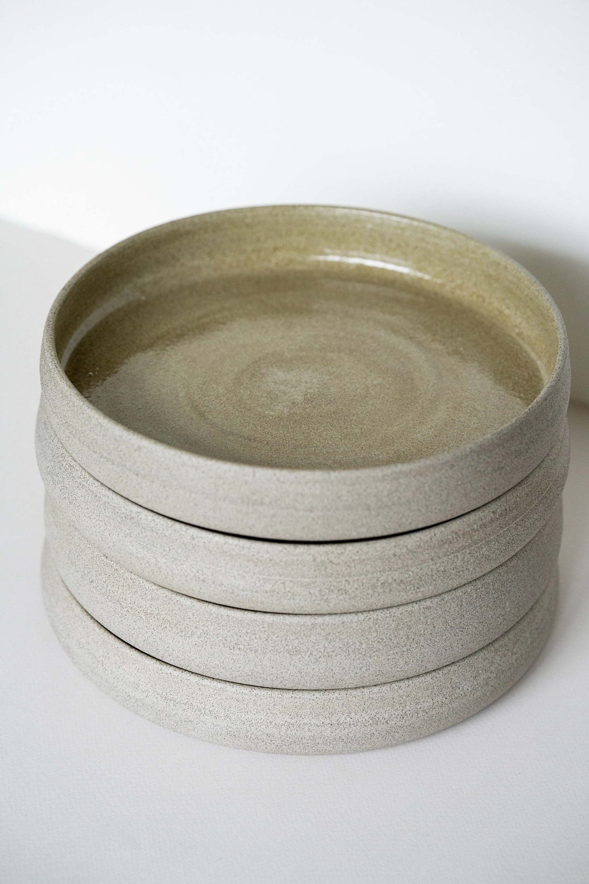 Handmade stoneware dinner plates with high sides in concrete by Creating Comfort, stack of 3 on Tampa Home & Garden Store