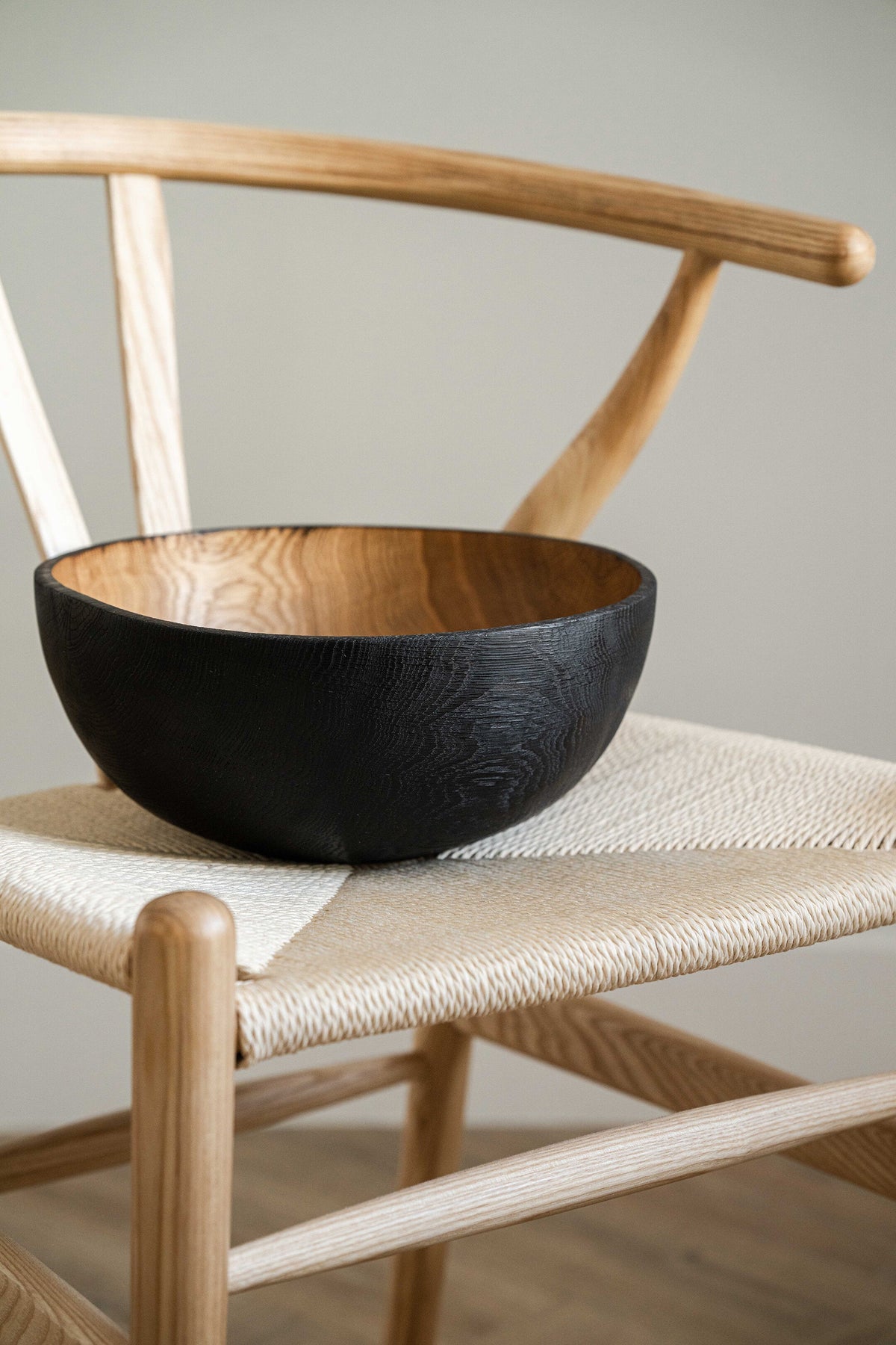 Hand carved half-charred wooden bowl CREATING COMFORT, black exterior, natural interior on Tampa Home & Garden Store
