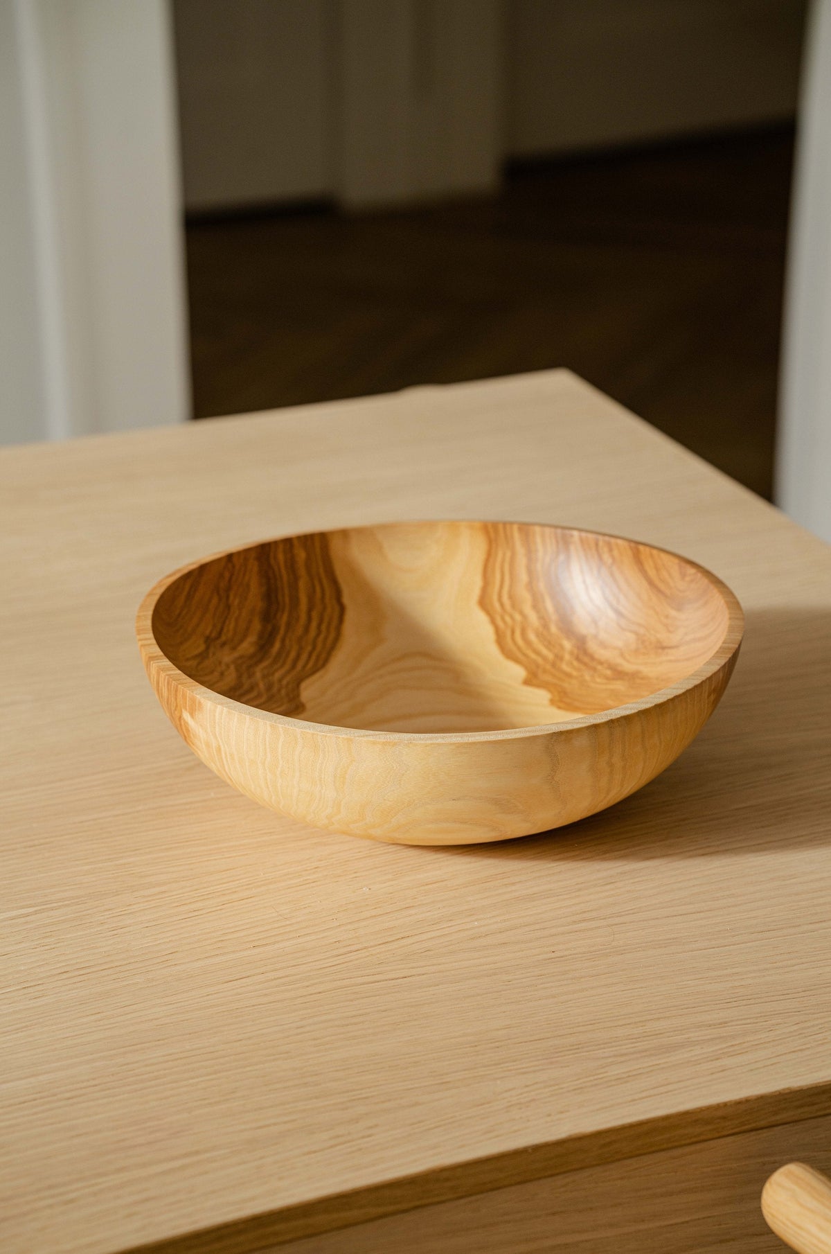 Hand carved wooden nesting bowl set with natural light wood grain on Tampa Home & Garden Store