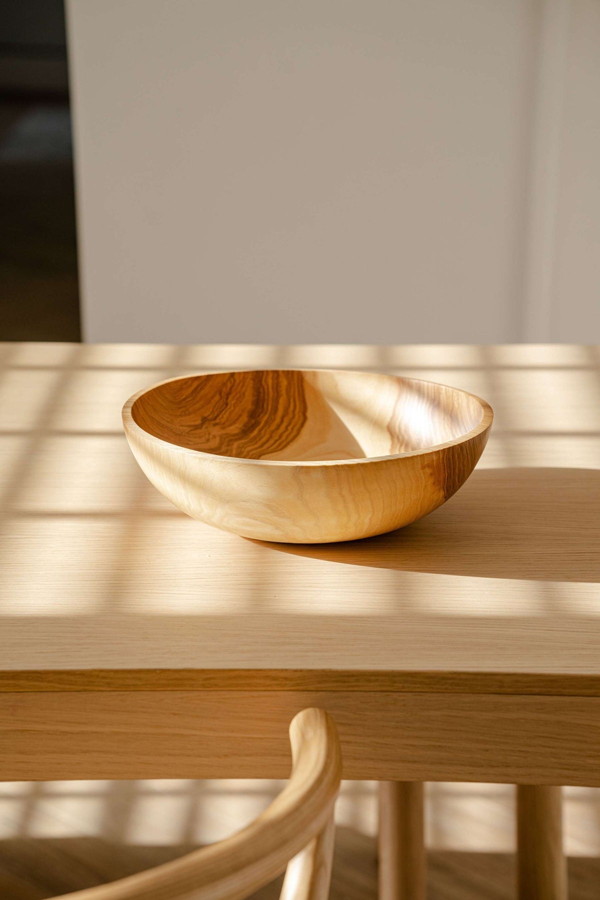 Hand Carved Wooden Nesting Bowl Set in light natural wood finish with visible grain on Tampa Home & Garden Store