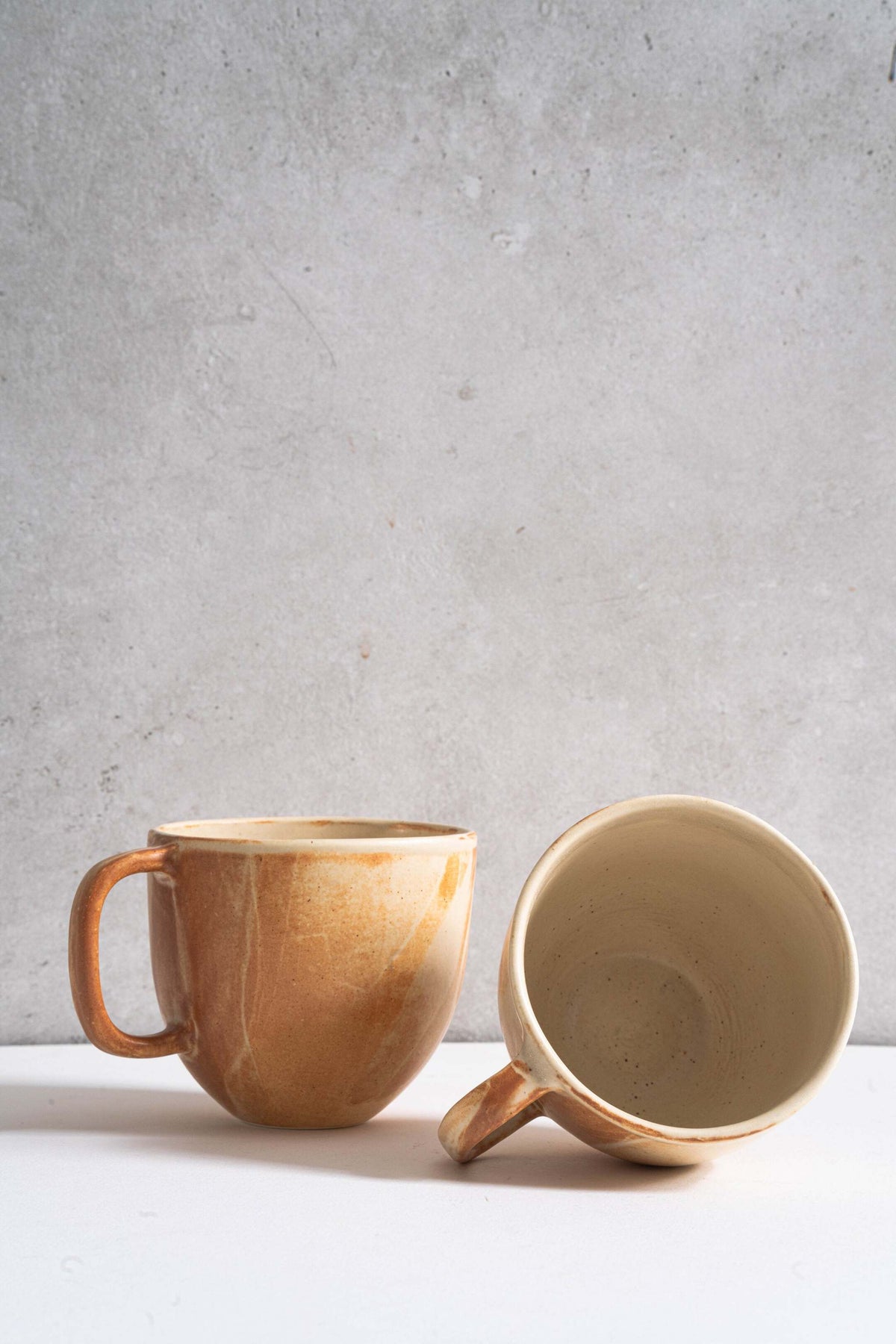 Stoneware beige coffee mug by Creating Comfort; earthy glaze, two mugs shown on Tampa Home & Garden Store