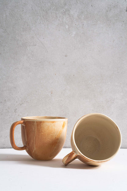Stoneware beige coffee mug by Creating Comfort; earthy glaze, two mugs shown on Tampa Home & Garden Store
