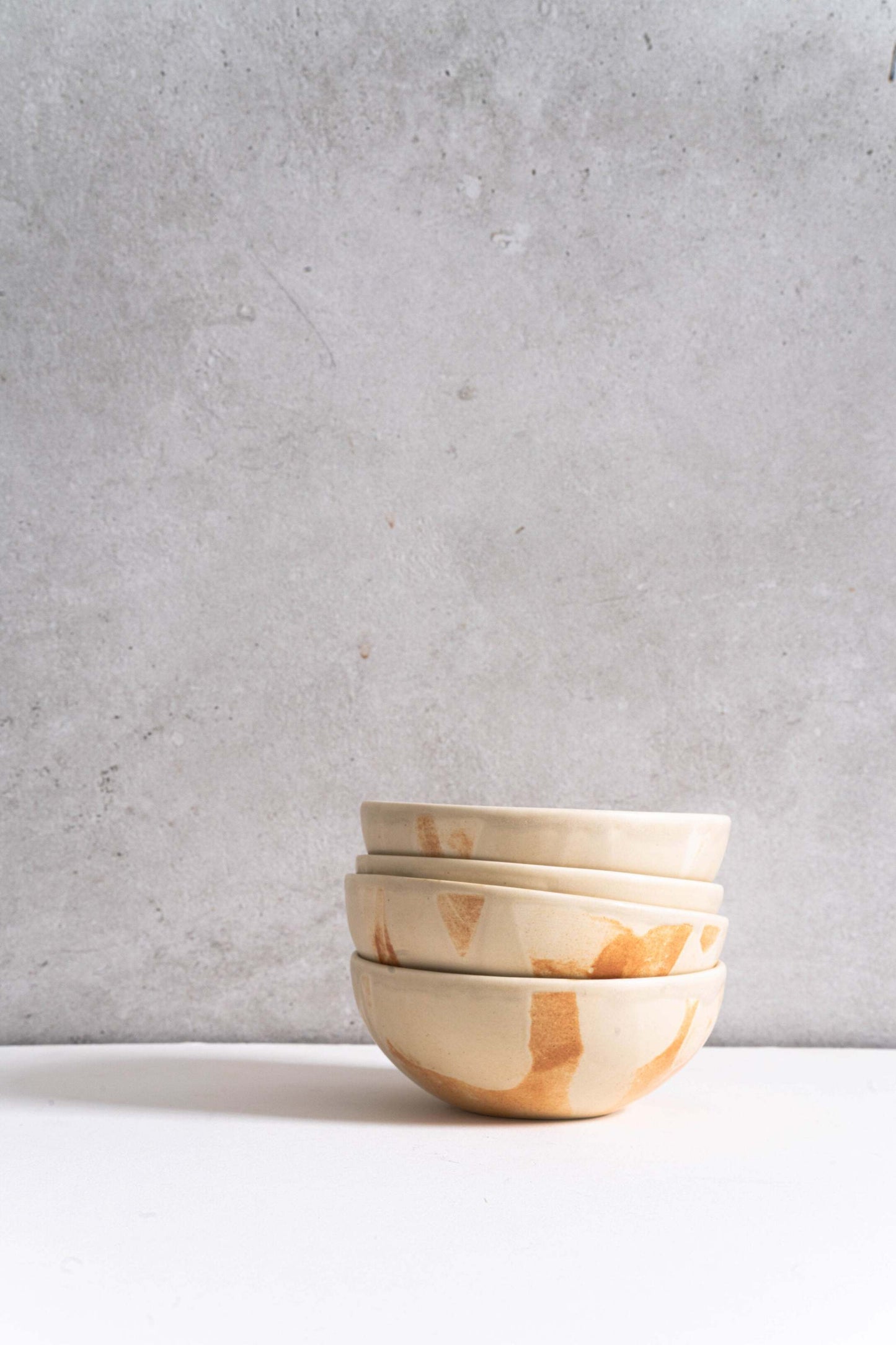 Beige Matte Stoneware Bowl and Rust Glaze