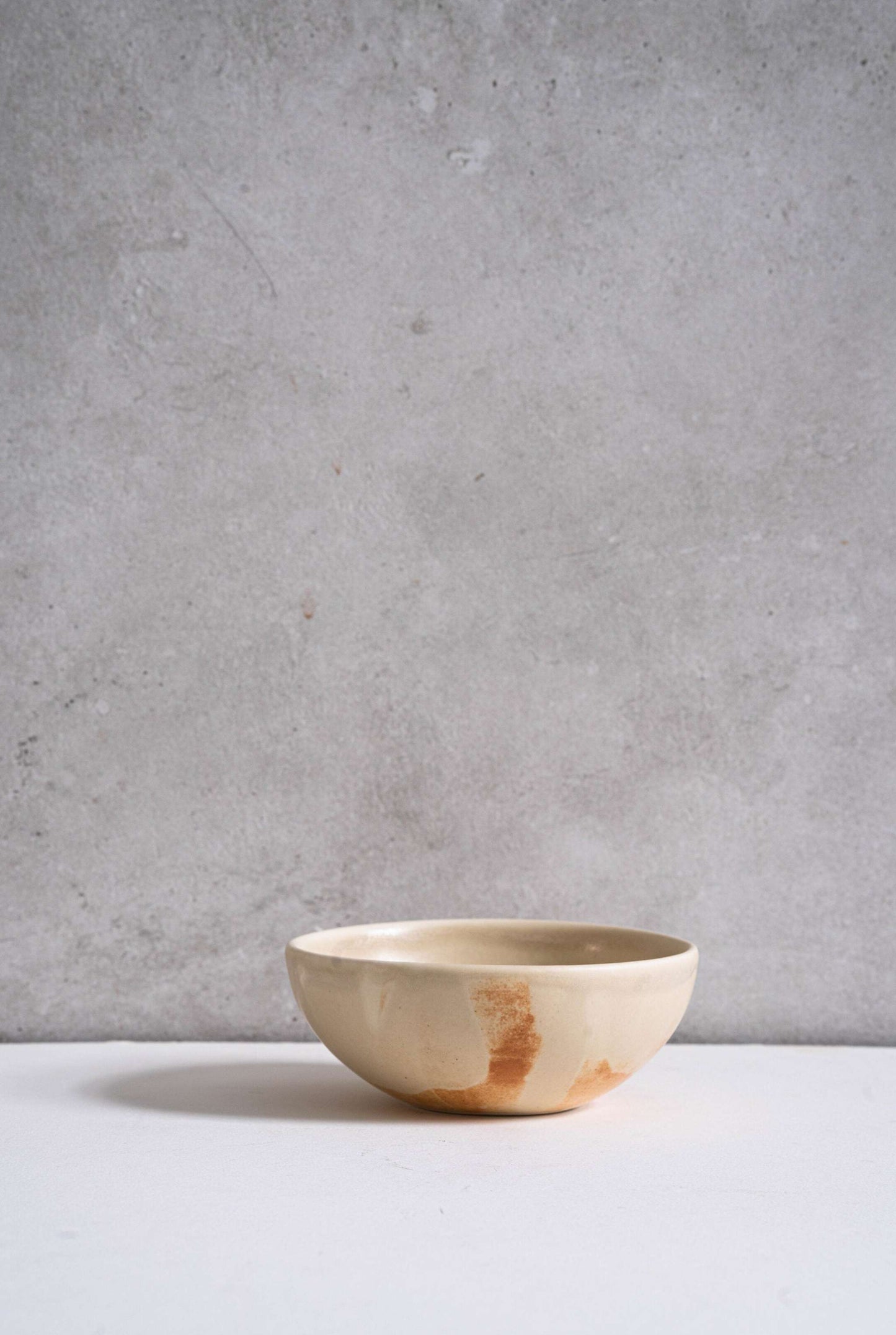 Beige Matte Stoneware Bowl and Rust Glaze