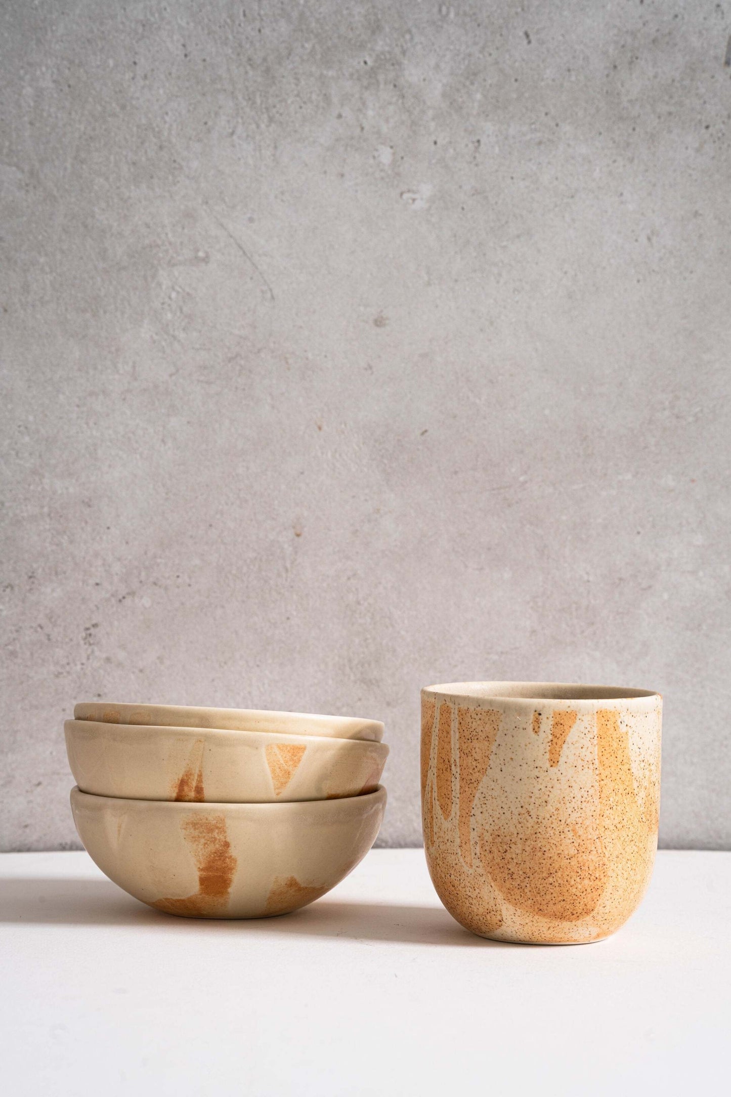 Beige Matte Stoneware Bowl and Rust Glaze