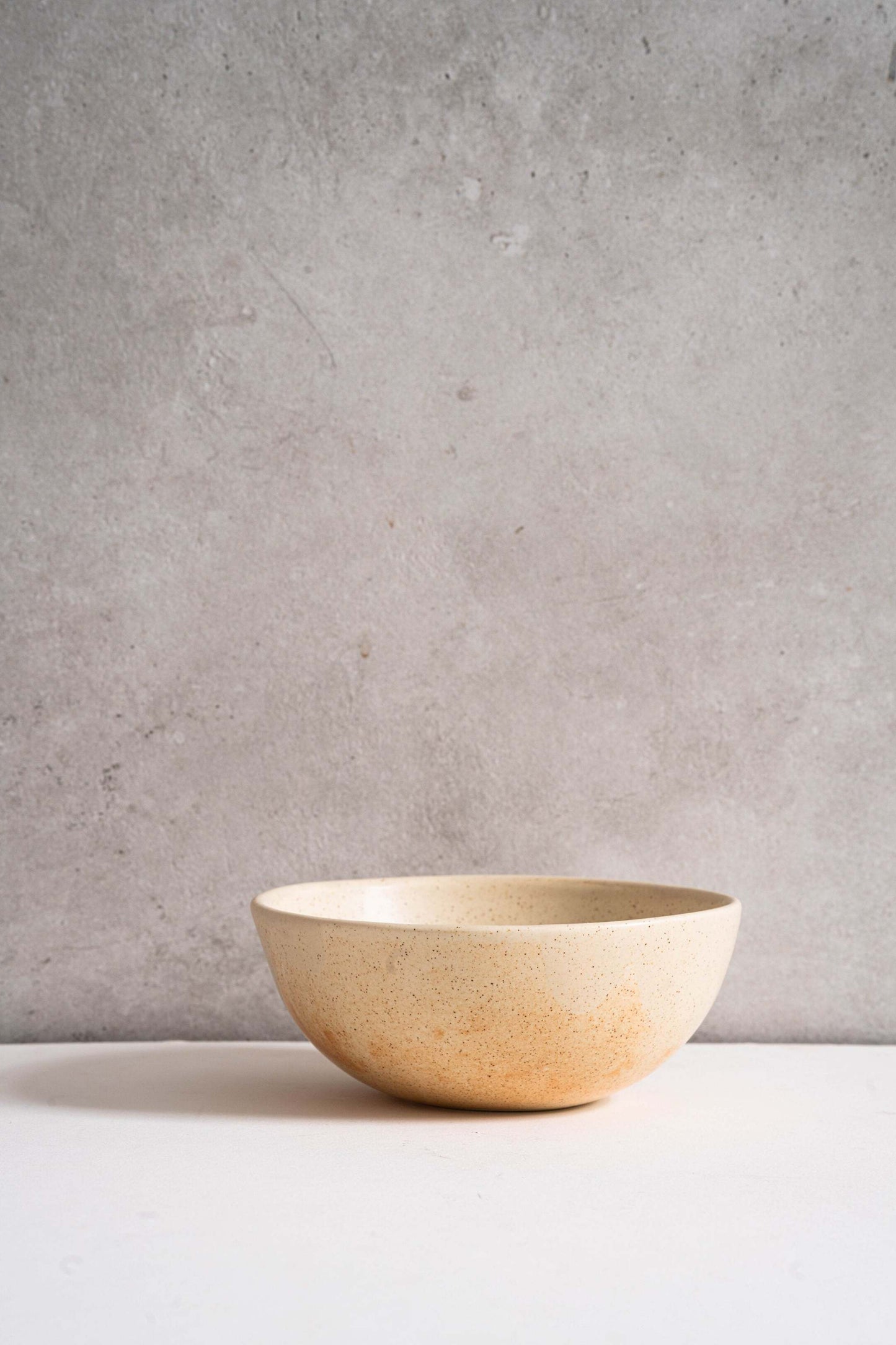 Beige Matte Stoneware Bowl and Rust Glaze