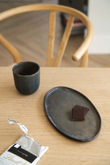 A Rust Matte Stoneware Serving Platter and Feast