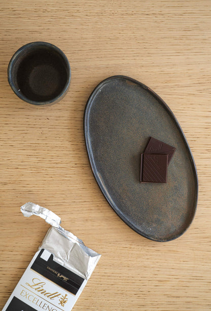A Rust Matte Stoneware Serving Platter and Feast