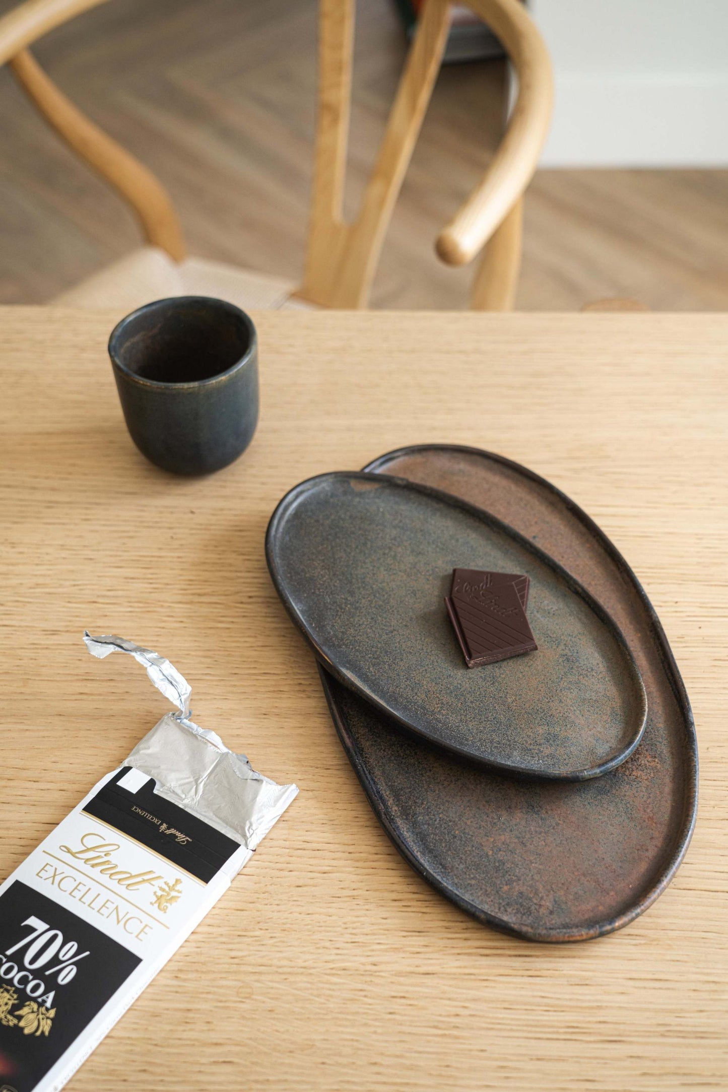 A Rust Matte Stoneware Serving Platter and Feast