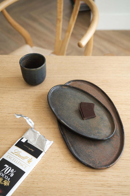 A Rust Matte Stoneware Serving Platter and Feast