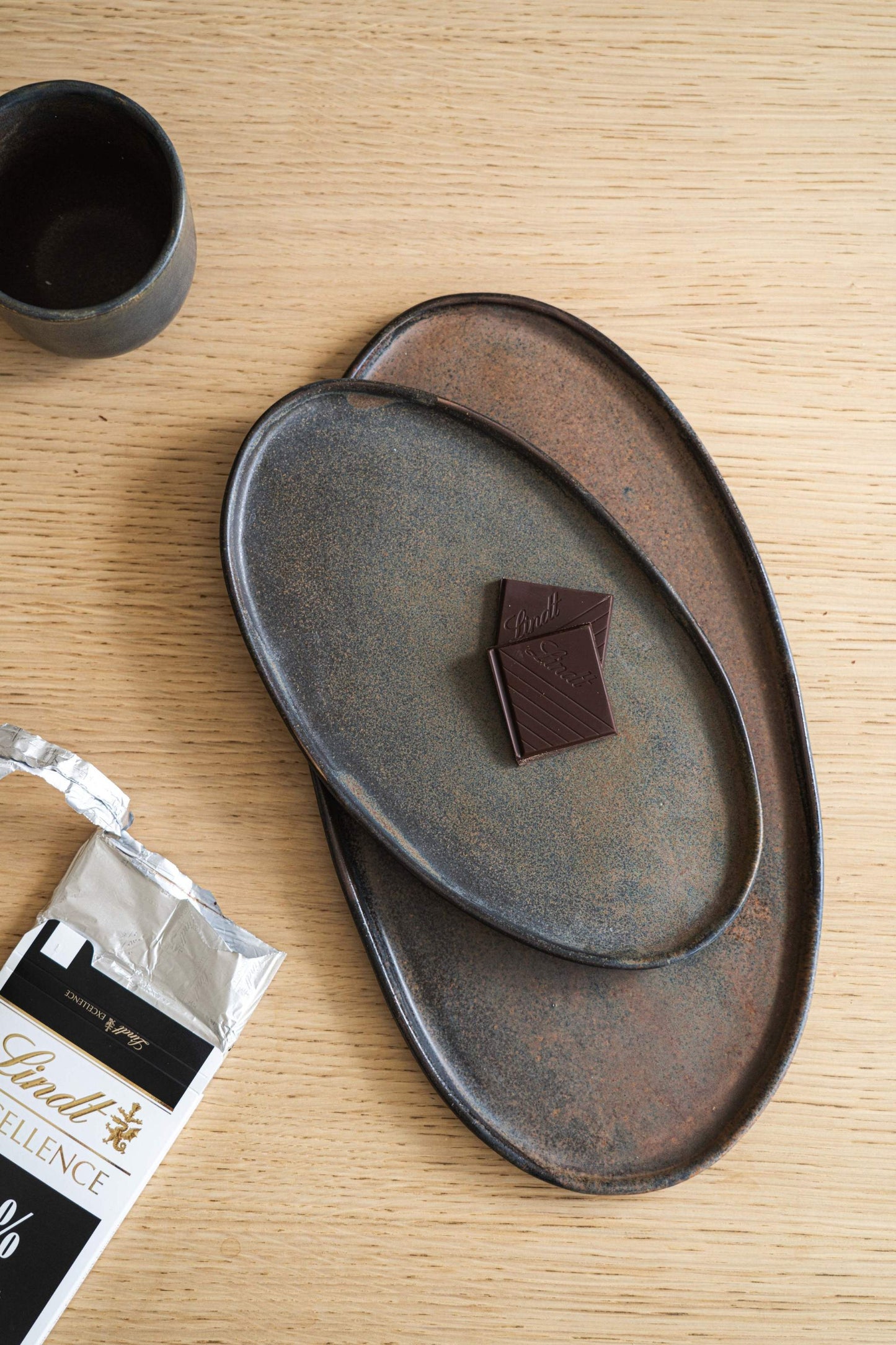 A Rust Matte Stoneware Serving Platter and Feast
