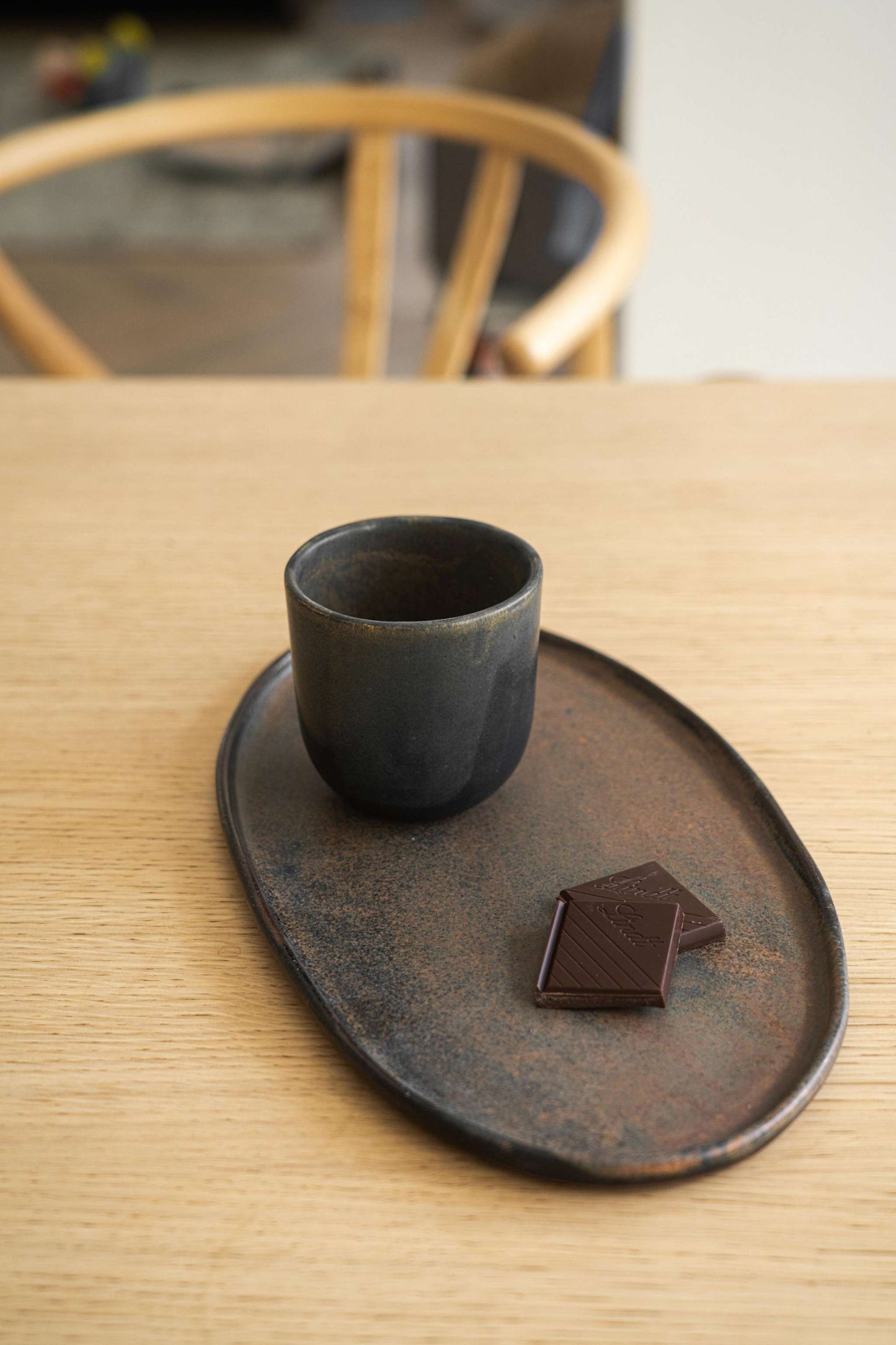 A Rust Matte Stoneware Serving Platter and Feast