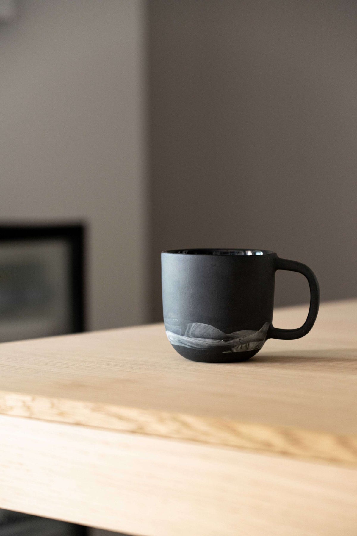 Handmade porcelain coffee mug black with gray landscape band by Creating Comfort Iceland on Tampa Home & Garden Store