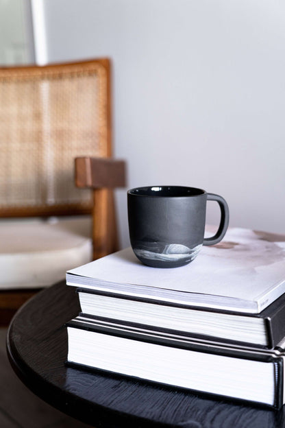 Handmade porcelain coffee mug in matte black by Creating Comfort, a Mugs piece on Tampa Home & Garden Store