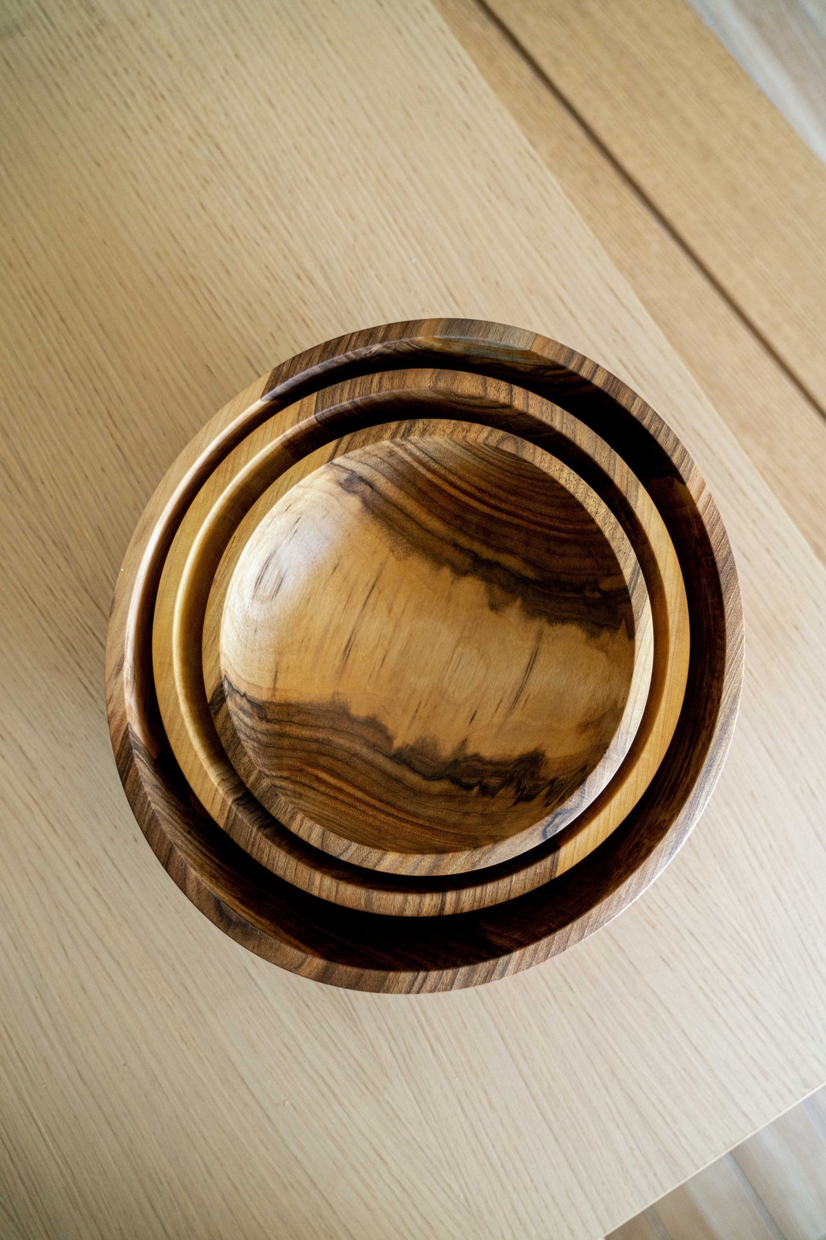 Hand Carved Walnut Wood Nesting Bowl Set, natural grain finish, stacked bowls on Tampa Home & Garden Store