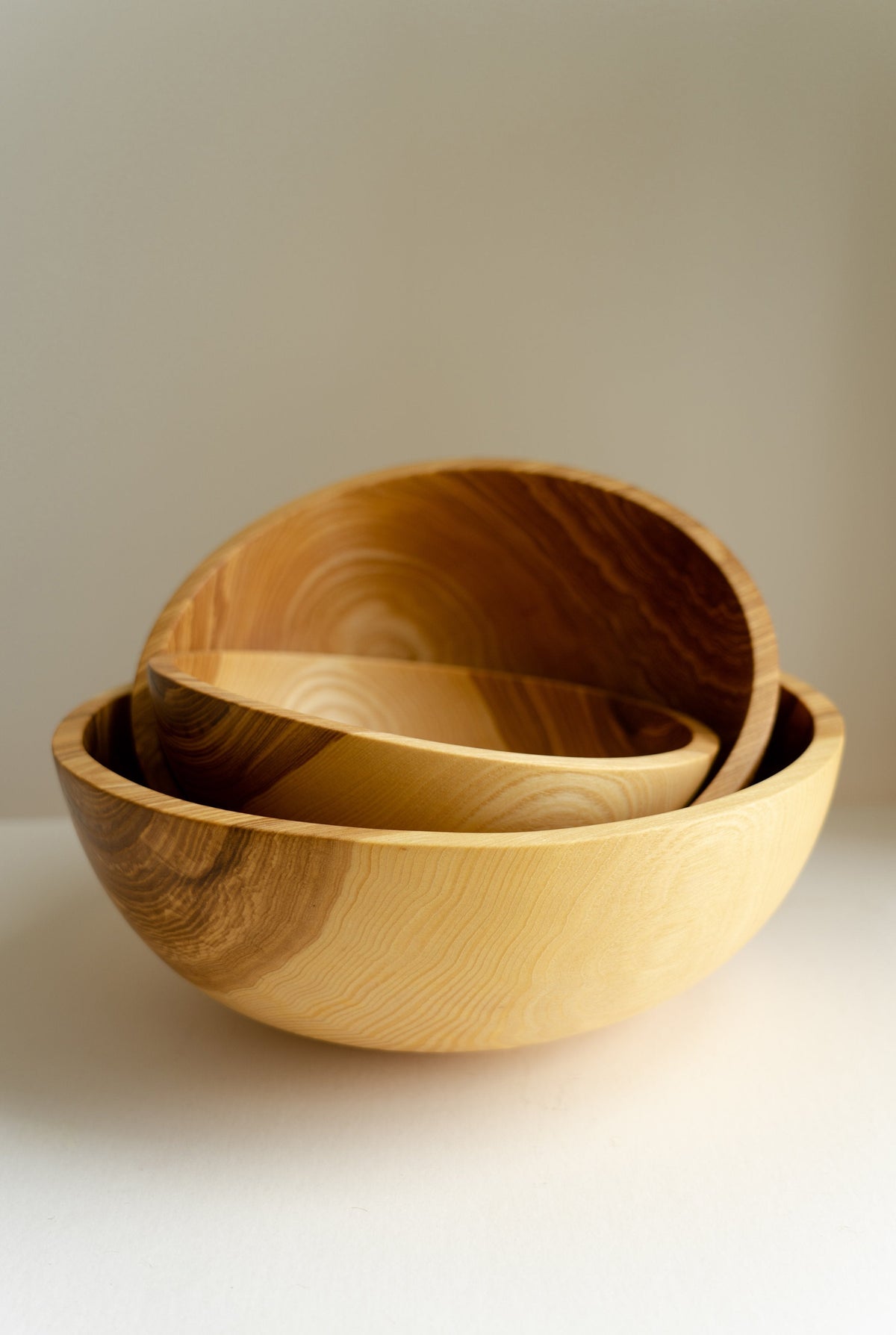 Hand carved wooden nesting bowl set, 3 bowls in natural light wood finish on Tampa Home & Garden Store