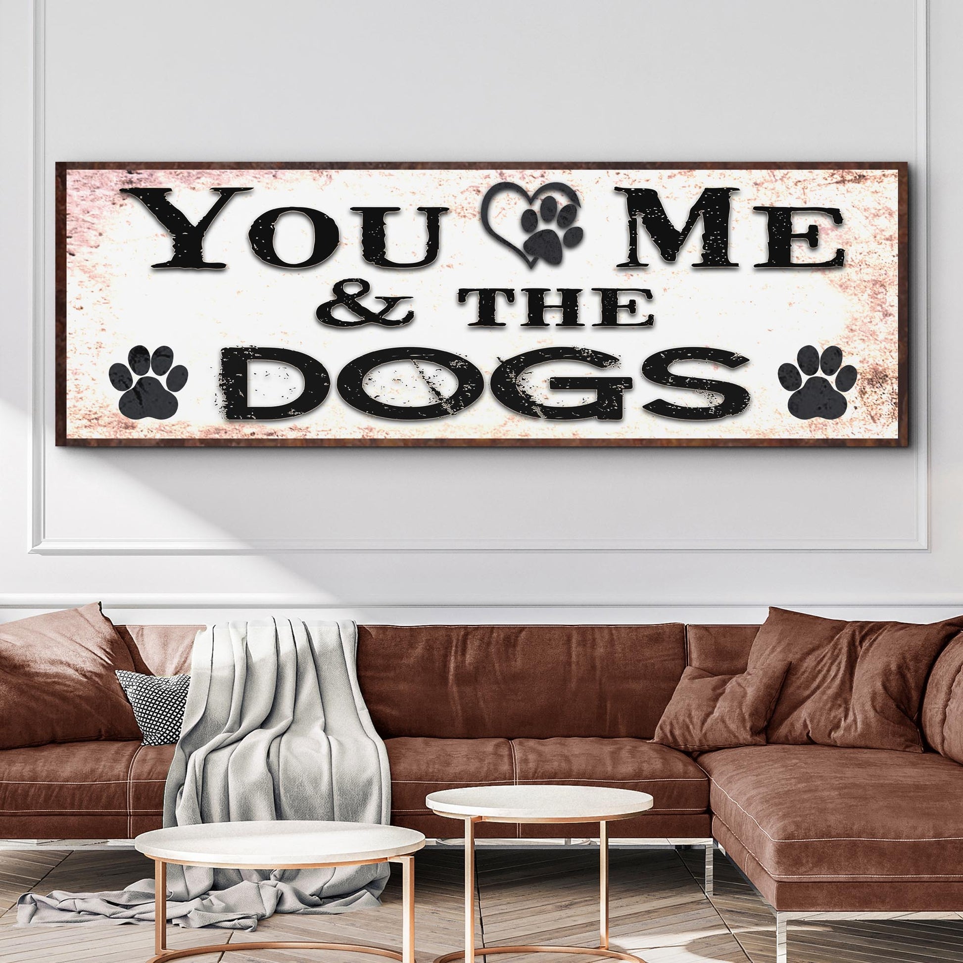 You And Me And The Dogs sign canvas with paw print accents and a rustic distressed white background on Tampa Home & Garden Store