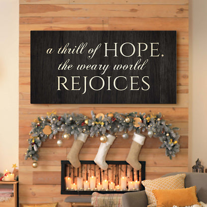 Canvas sign with ivory script reading a thrill of HOPE the weary world REJOICES on Tampa Home & Garden Store