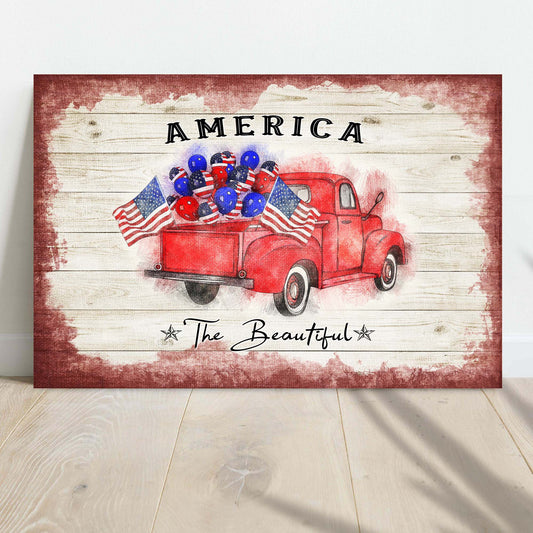 America The Beautiful Sign II canvas by Tailored Canvases with rustic white planks and red truck on Tampa Home & Garden Store