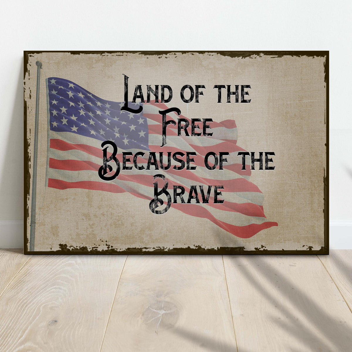 Canvas Land Of The Free Because Of The Brave Sign II by Tailored Canvases beige canvas with flag on Tampa Home & Garden Store