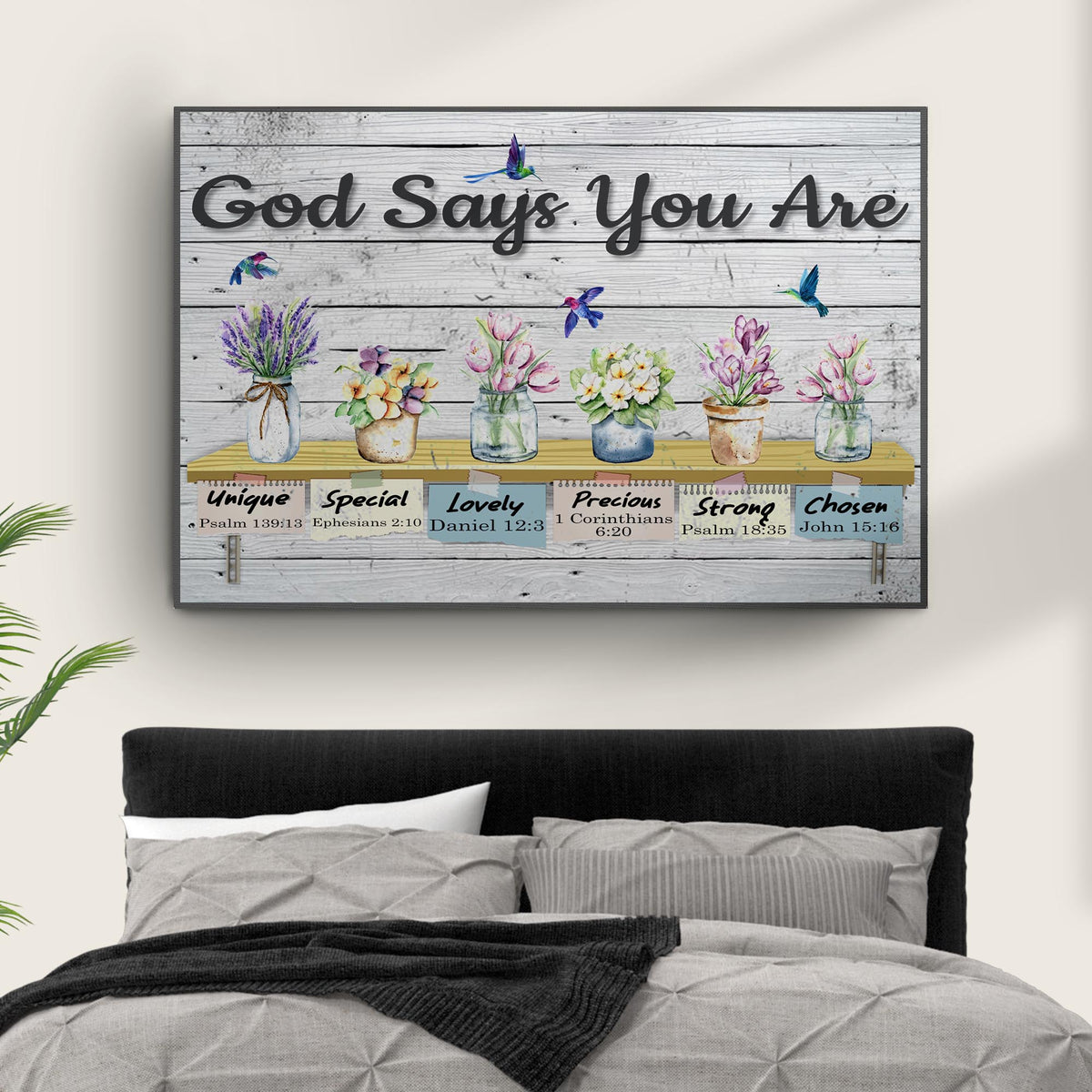 Canvas sign God Says You Are by Tailored Canvases on rustic wood with colorful flowers on Tampa Home & Garden Store