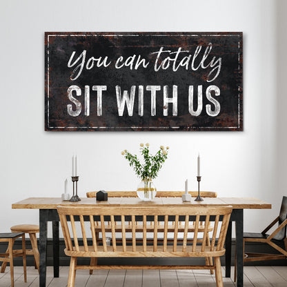 Tailored Canvases sign You Can Totally Sit With Us with white script on dark backdrop on Tampa Home & Garden Store