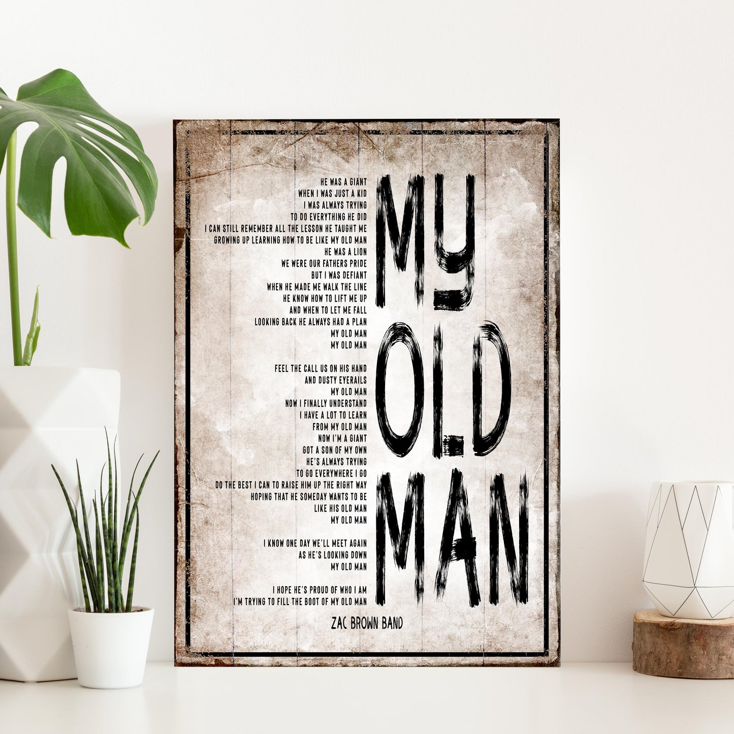My Old Man canvas sign by Tailored Canvases, distressed beige with bold black text on Tampa Home & Garden Store
