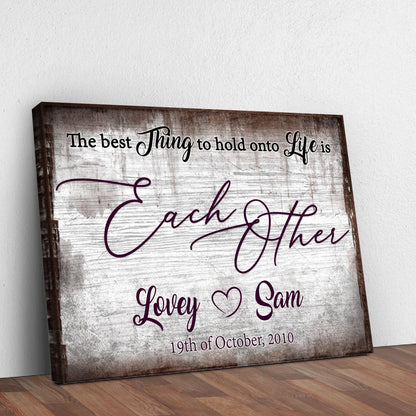 Tailored Canvases canvas sign with wood frame; The Best Thing to Hold Onto Life Is Each Other on Tampa Home & Garden Store