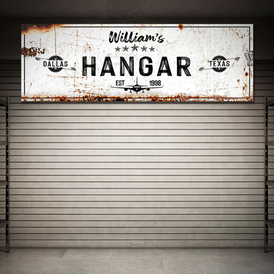 Hangar Sign II canvas with white, rusted sign and vintage airplane motif EST 1998 on Tampa Home & Garden Store
