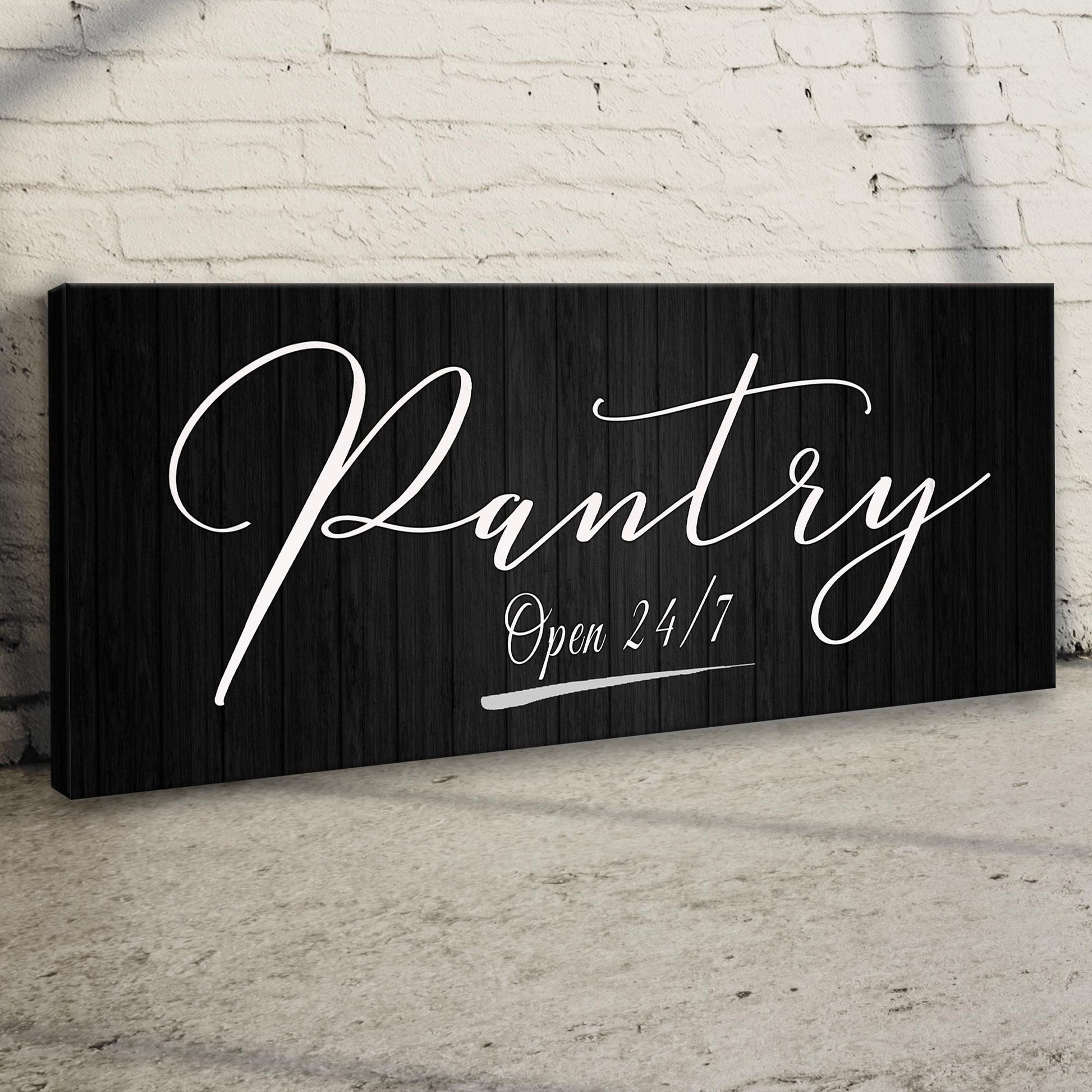 Pantry Open 24/7 sign on a black wood panel with white cursive text on Tampa Home & Garden Store