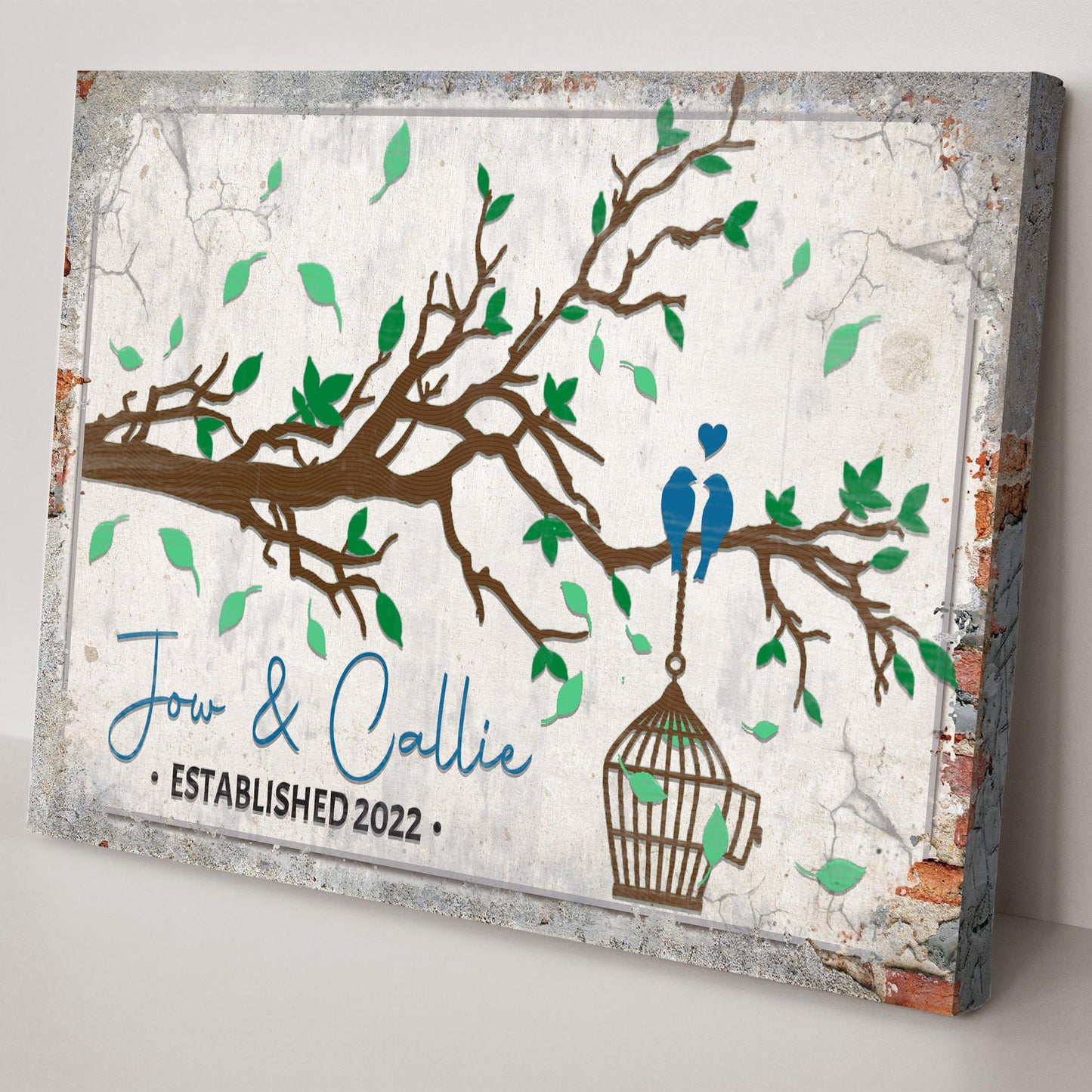 Love Birds Couple Sign canvas featuring brown tree branches, green leaves, and two blue birds on Tampa Home & Garden Store
