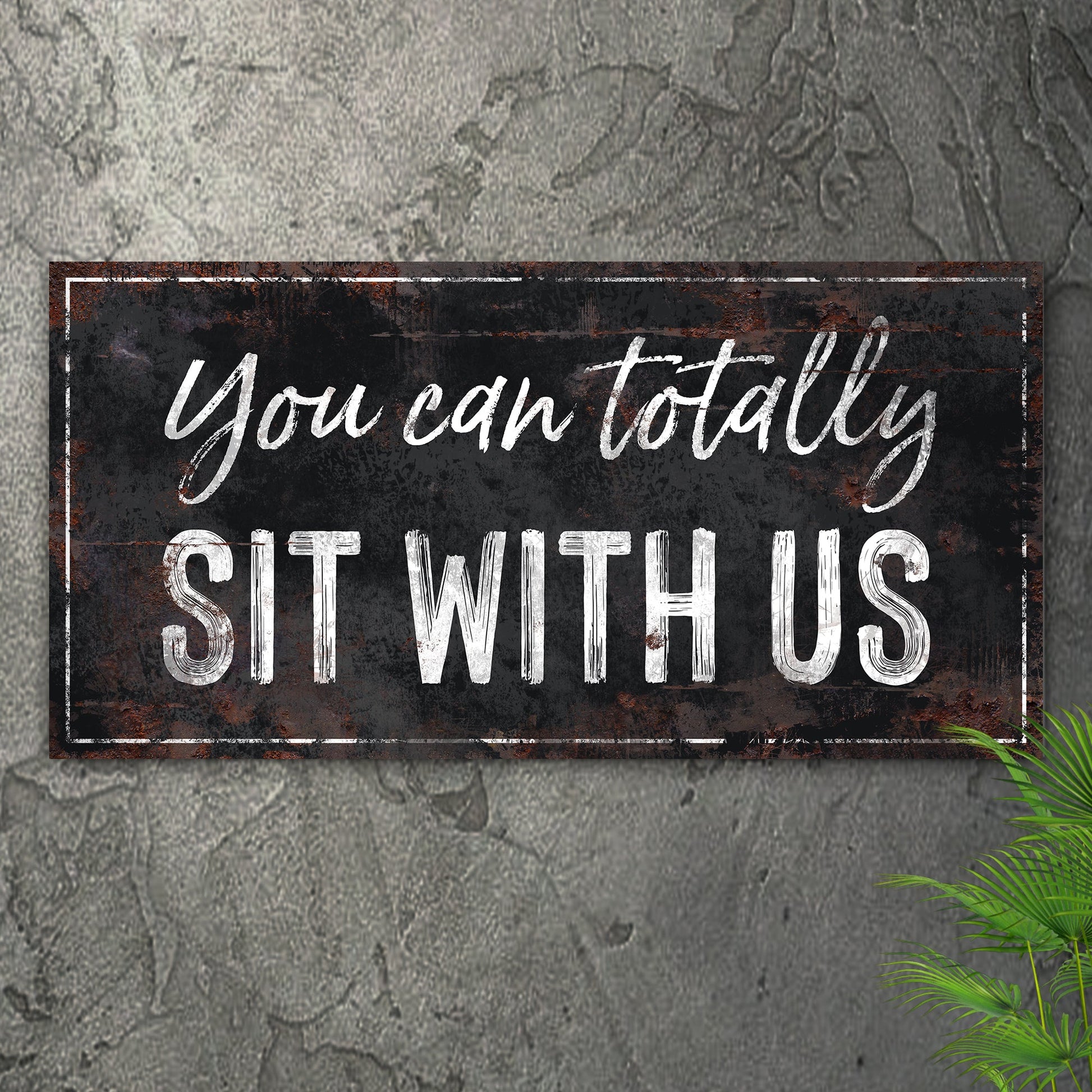 Tailored Canvases canvas sign reading You Can Totally Sit With Us in black and white script on Tampa Home & Garden Store