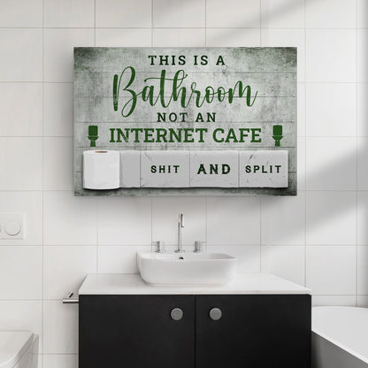 Canvas sign This Is A Bathroom Not An Internet Cafe in green script on weathered wood on Tampa Home & Garden Store
