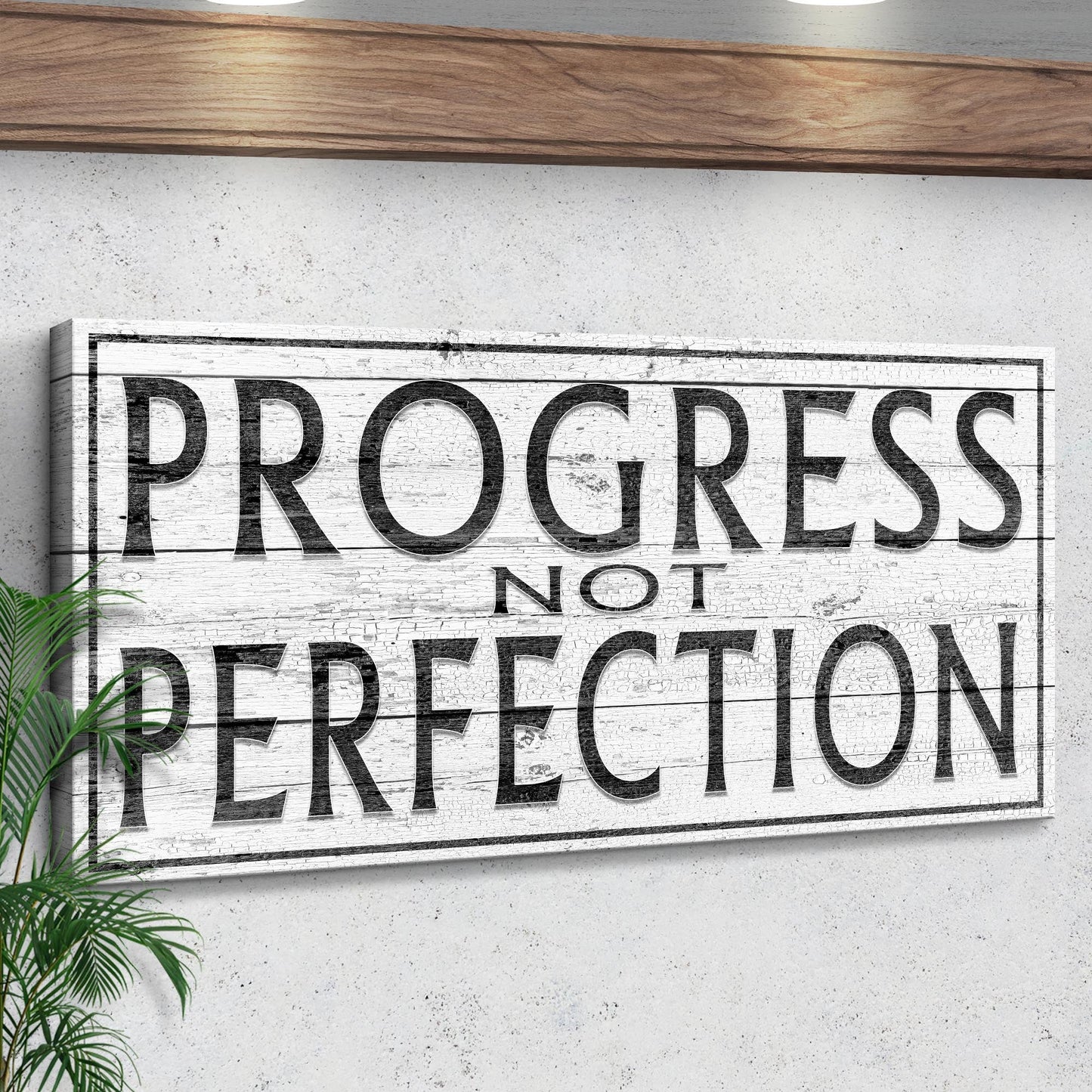 Progress Not Perfection Sign canvas by Tailored Canvases with distressed white wood frame on Tampa Home & Garden Store