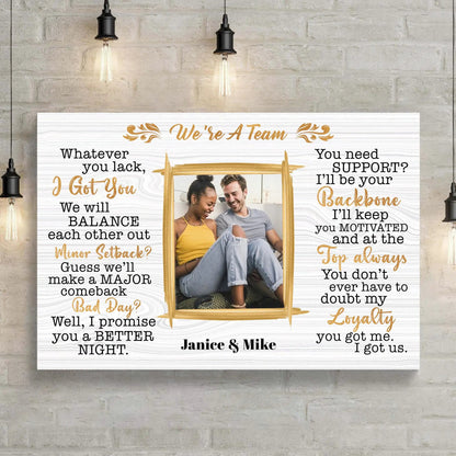 We're A Team IV canvas sign with whitewashed wood look and gold script Tailored Canvases on Tampa Home & Garden Store