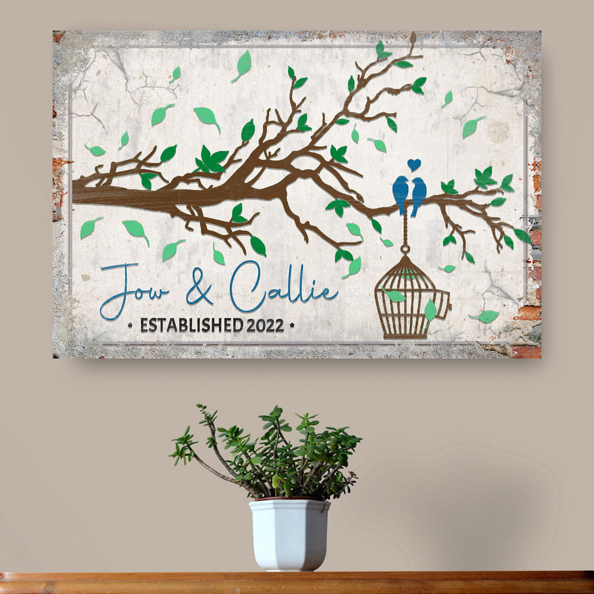Love Birds Couple Sign canvas with brown branch and two blue birds near a hanging cage on Tampa Home & Garden Store