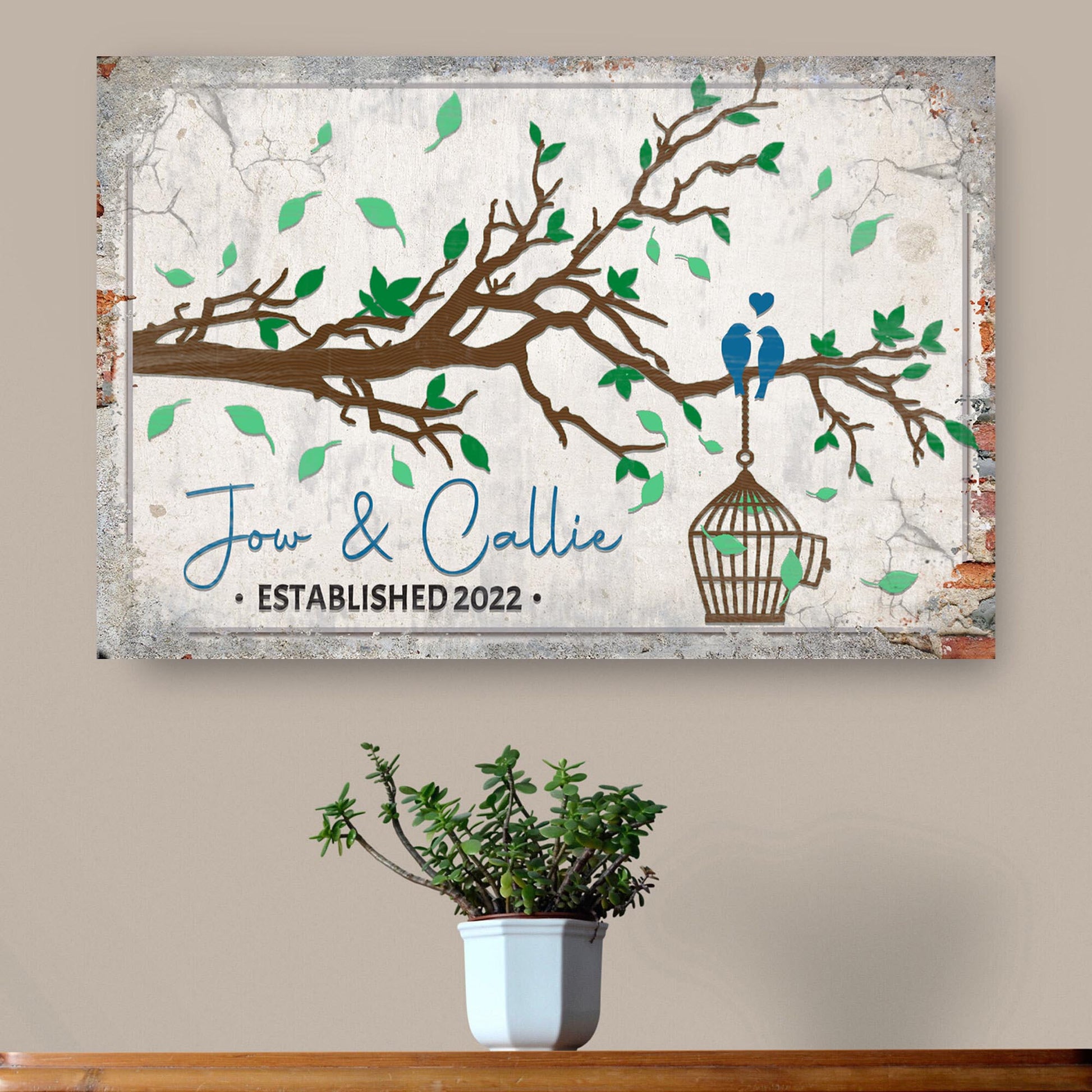 Love Birds Couple Sign canvas with brown branch and two blue birds near a hanging cage on Tampa Home & Garden Store